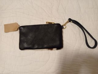 Cartera Piel Vaca Marrón y Blanca y piel negra.