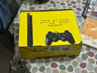 Consola PS2 Slim con caja, manuales y 11 juegos