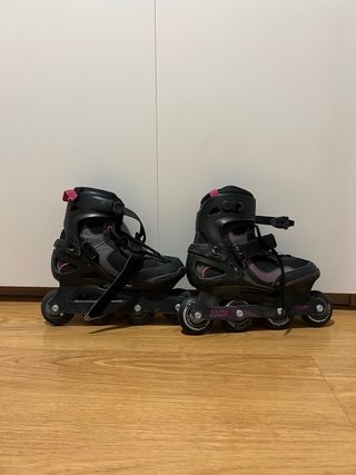 Patines Oxelo negros y rosas con bolsa
