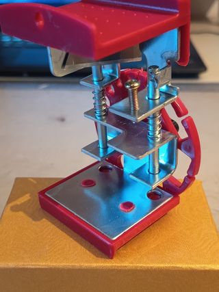 Spelacavi rosso e metallo