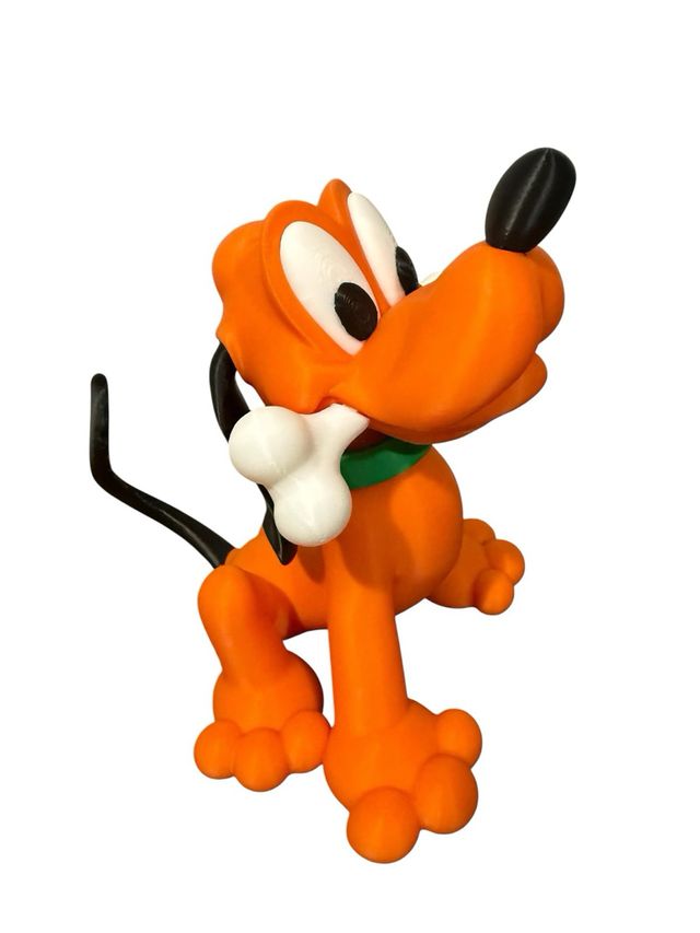 Figurita de Pluto con hueso