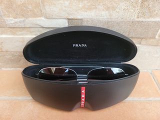 Gafas de sol Prada plateadas y negras