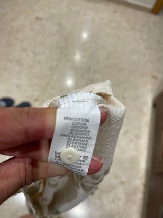 Conjunto top y shorts estampado hojas dorado