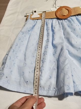 Completo top e shorts azzurri 14 anni