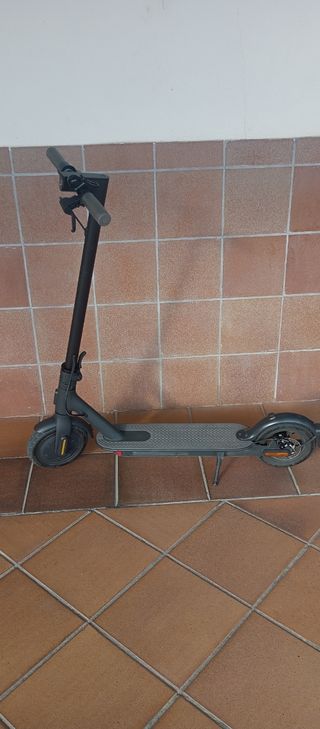 Patinete Xiaomi con caja y ticket