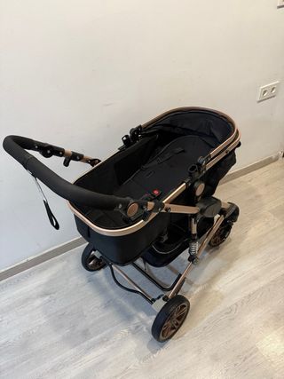 Carrito de bebé 2en1 negro y dorado