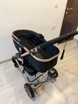 Carrito de bebé 2en1 negro y dorado