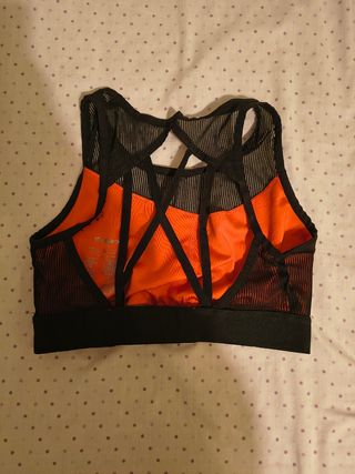 Top deportivo naranja y negro talla S