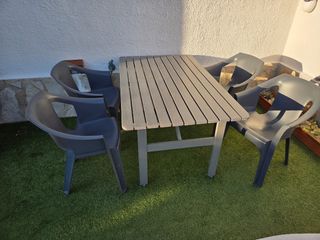 Conjunto mesa madera y 6 sillas de jardín.