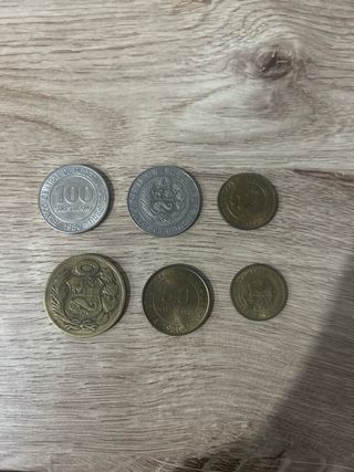 Monedas Peruanas: 100, 50 y 10 Soles de Oro