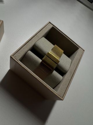 Reloj estilo SKYLINE dorado y blanco