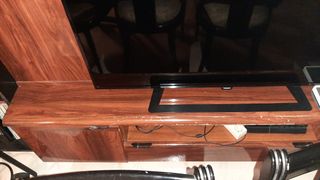 Mueble de comedor madera oscura
