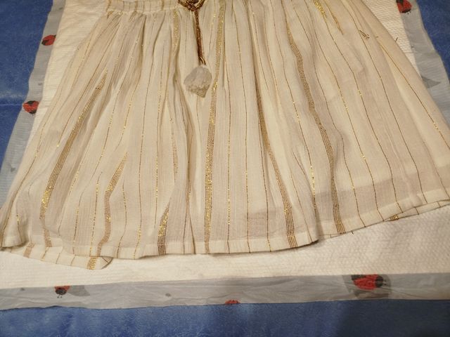 Falda corta con hilos dorados Talla única