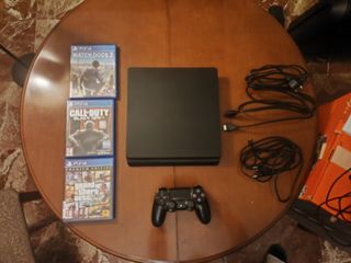 PS4 Slim 1TB Negra + 3 Juegos y volante pxn v9