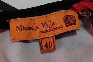 Vestido de flamenca rojo con lunares negros
