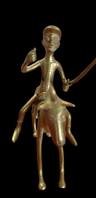 Escultura tribal de jinete en bronce – arte Dhokra