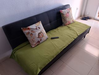 Sofá cama negro y verde