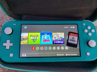 Nintendo Switch Lite Verde + funda+juego físico