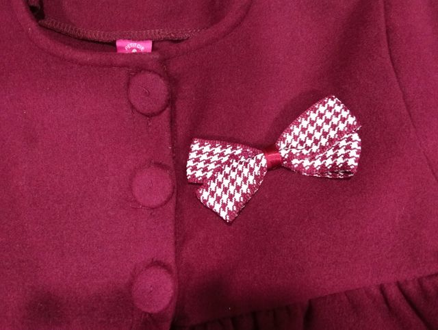 Abrigo granate con lazo