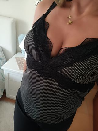 Top Àmati nero con pizzo