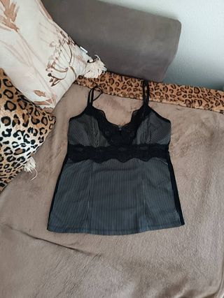 Top Àmati nero con pizzo