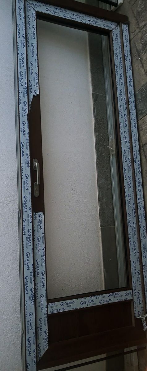 Puerta PVC imitación madera nogal + cristal NUEVA