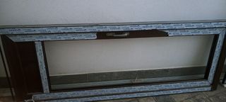 Puerta PVC imitación madera nogal + cristal NUEVA