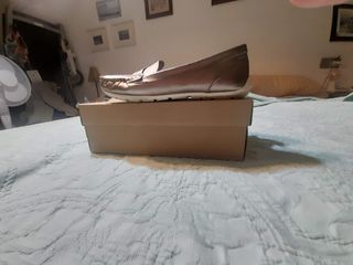 Mocasines dorados