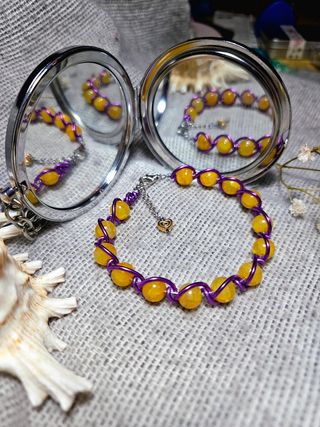 Bracciale artigianale perline viola e gialle
