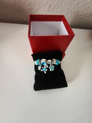 Pulsera de charms azul y plateada
