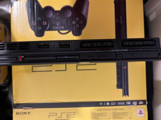 PlayStation 2 + Mandos Buzz + Juegos