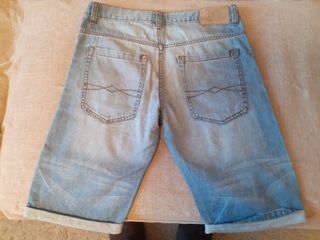 Bermudas vaqueras desgastadas