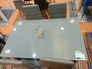 Mesa de cristal con 4 sillas