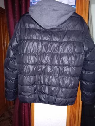 Cazadora niño negra y naranja