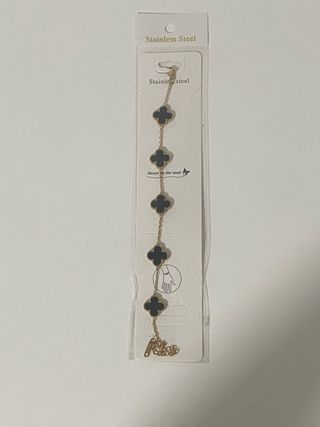 Pulsera Van Cleef & Arpels Negra y Dorada