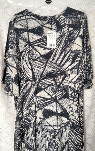 VESTIDO DESIGUAL BEIGE Y NEGRO TALLA 46.