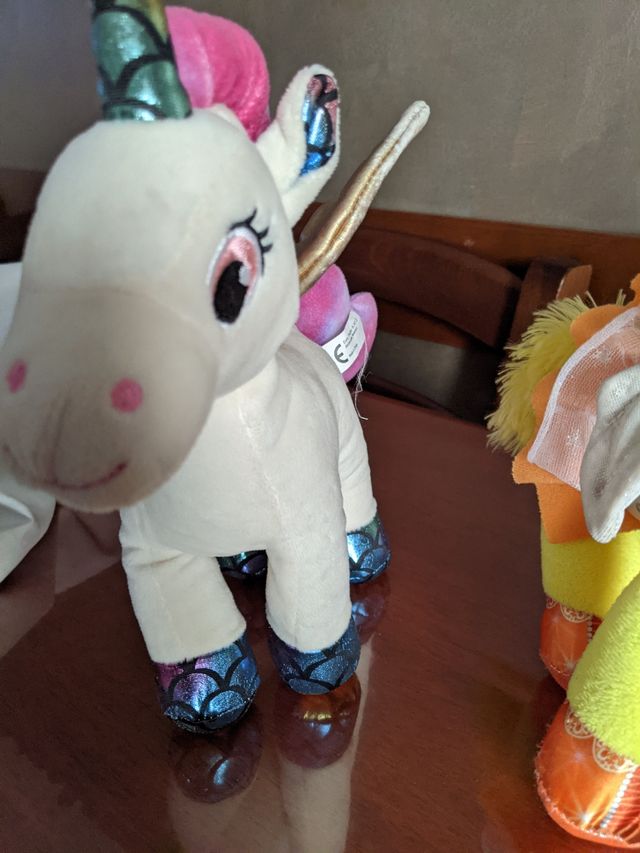 3 unicorni peluche