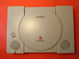 Consola PS1 + Bolsa + Juego Francia 98