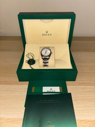 Rolex Oyster Perpetual Date 115234
