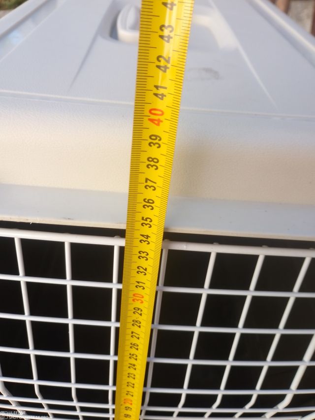 Transportín para perro gris y blanco