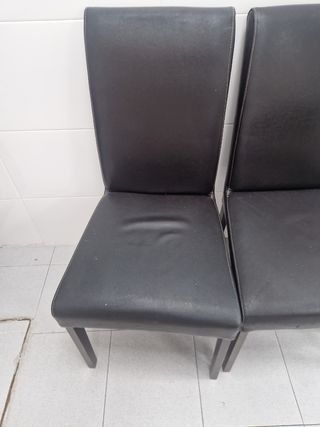 Silla de comedor negra de piel