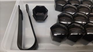 Copridadi ruota auto esagonali neri