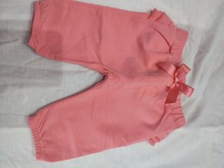 Pantaloni bambina rosa con fiocco