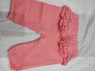 Pantaloni bambina rosa con fiocco