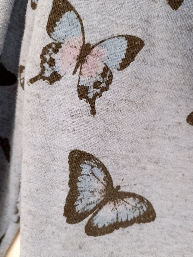 Sudadera mariposas azul con cremallera y capucha