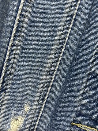 Chaqueta vaquera desgastada larga