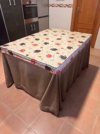Mesa camilla con mantel de cristal