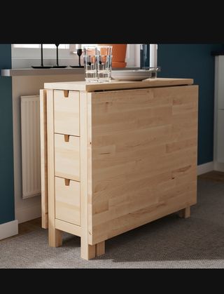 Mesa plegable de madera maciza con cajones