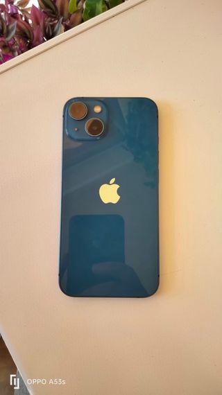 iPhone 13 azul 128GB, estado de la batería al 89%.