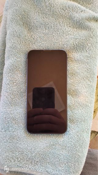 iPhone 13 azul 128GB, estado de la batería al 89%.